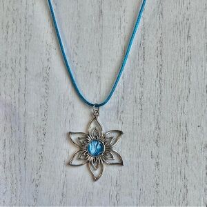 Silver Flower Pendant Necklace with Blue Cord